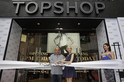 FILE - 25 OCTOBER 2018: Retail business man Sir Philip Green has been named in Parliament for sexual harassment of staff HONG KONG - JUNE 06: Sir Philip Green the owner of Topshop and Taiwanese actress Gwei Lun Mei cut a ribbon to mark the opening of the new Topshop store as TV host Mandy Lieu watches on June 6, 2013 in Hong Kong, Hong Kong. Gwei Lun Mei is the the first Asian ambassador of Topshop. (Photo by Jessica Hromas/Getty Images)