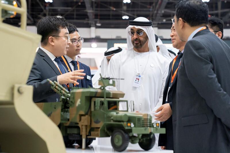ABU DHABI, UNITED ARAB EMIRATES - February 20, 2019: HH Sheikh Mohamed bin Zayed Al Nahyan, Crown Prince of Abu Dhabi and Deputy Supreme Commander of the UAE Armed Forces (C) visits Hanwha stand, during the 2019 International Defence Exhibition and Conference (IDEX), at Abu Dhabi National Exhibition Centre (ADNEC).
( Ryan Carter for the Ministry of Presidential Affairs )
---