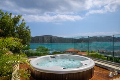 A jacuzzi sits on the terrace leading from one of the master bedrooms. Photos: Greece Sotheby’s International Realty