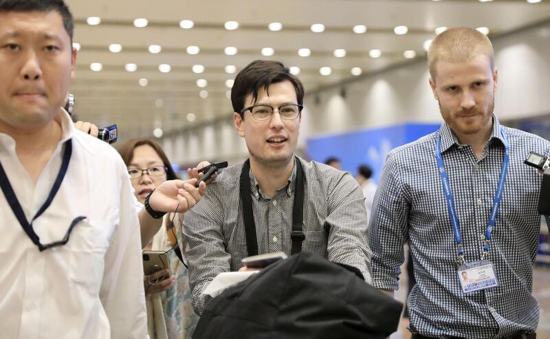 REFILE - UPDATING CAPTION ADVISORY An Australian student Alek Sigley, 29,  who was detained in North Korea, arrives at Beijing international airport in Beijing, China, July 4, 2019, in this photo taken by Kyodo. Mandatory credit Kyodo/via REUTERS ATTENTION EDITORS - THIS IMAGE WAS PROVIDED BY A THIRD PARTY. MANDATORY CREDIT. JAPAN OUT. NO COMMERCIAL OR EDITORIAL SALES IN JAPAN.  TPX IMAGES OF THE DAY