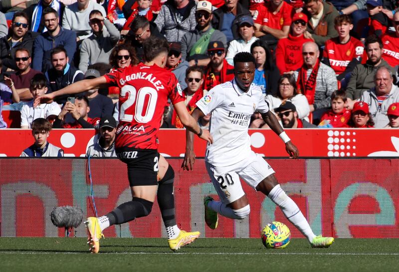 Real Madrid's Vinicius Junior takes on Mallorca's Giovanni Gonzalez. AFP