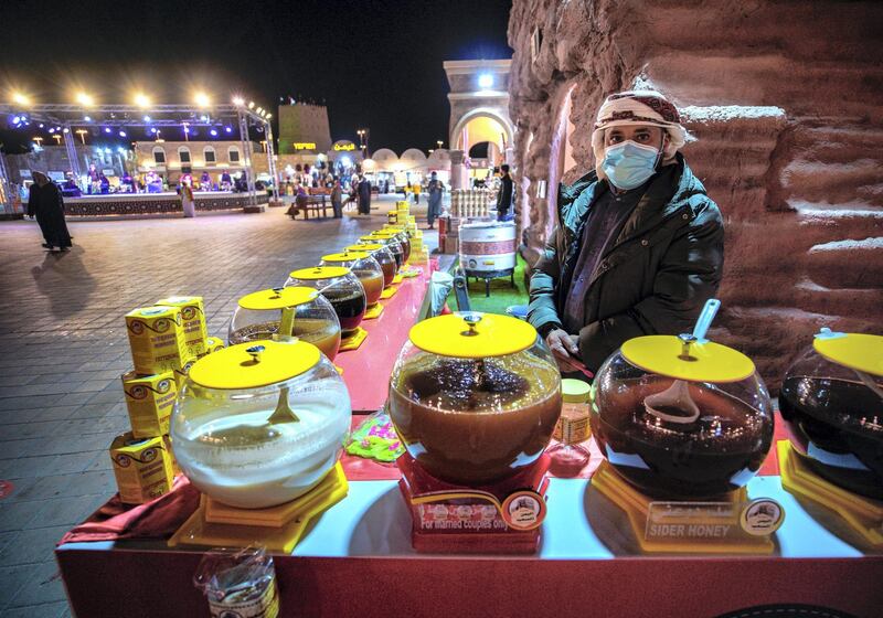 Abu Dhabi, United Arab Emirates, January 10, 2021. Honey for sale at the Jordanian market area at the Sheikh Zayed Festival.
Victor Besa/The National
Section:  NA
Reporter:  Saeed Saeed