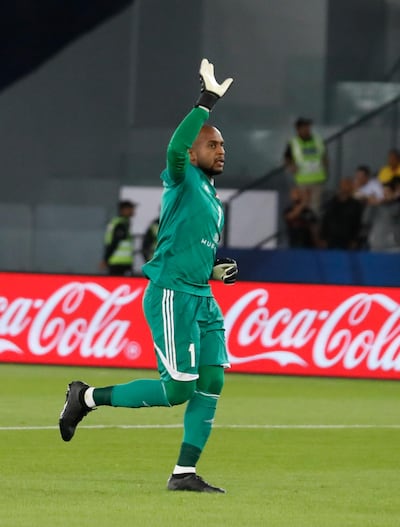 Al Jazira's goalkeeper Ali Khaseif waves as he leaves the field of play during the Club World Cup semifinal soccer match between Real Madrid and Al Jazira Club at Zayed sport city in Abu Dhabi, United Arab Emirates, Wednesday, Dec. 13, 2017. (AP Photo/Hassan Ammar)