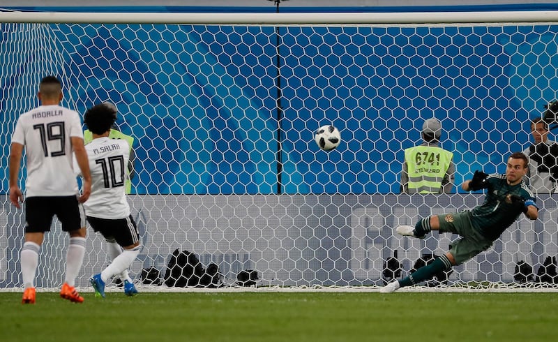 Mohamed Salah scores from a penalty during the FIFA World Cup 2018 group A preliminary round match between Russia and Egypt. Etienne Laurent / EPA