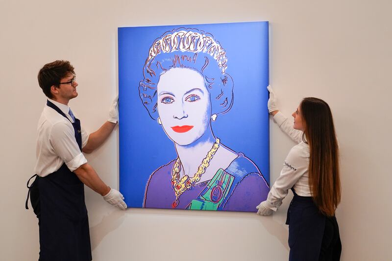  Andy Warhol's pop art screen print of the queen, painted in 1985, is among the highlights. AP