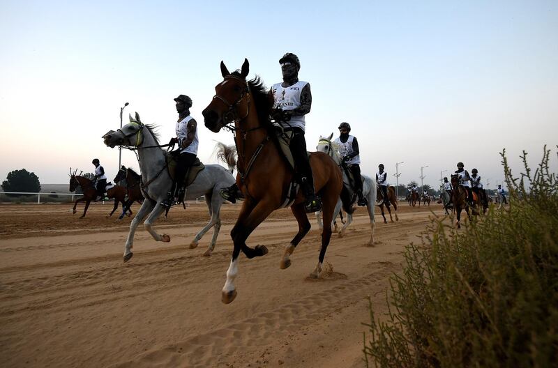Riders compete in the Sheikh Mohammed bin Rashid Al Maktoum Endurance Cup at Dubai International Endurance City. Tom Dulat / Getty Images