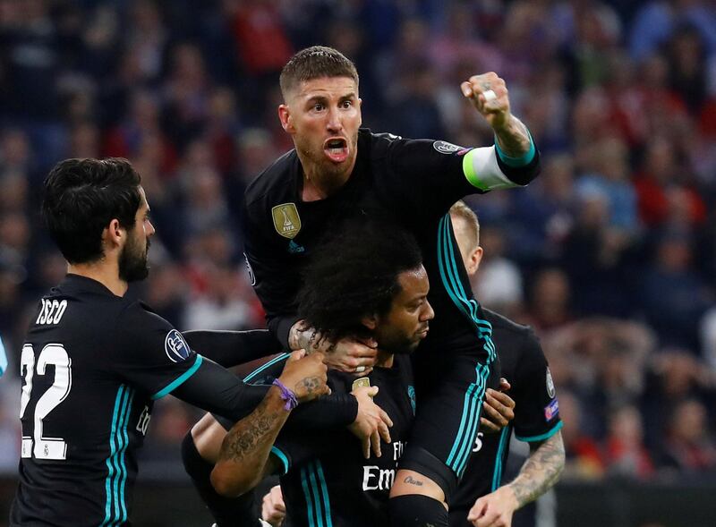 Soccer Football - Champions League Semi Final First Leg - Bayern Munich vs Real Madrid - Allianz Arena, Munich, Germany - April 25, 2018   Real Madrid's Marcelo celebrates scoring their first goal with Sergio Ramos and Isco   REUTERS/Kai Pfaffenbach     TPX IMAGES OF THE DAY
