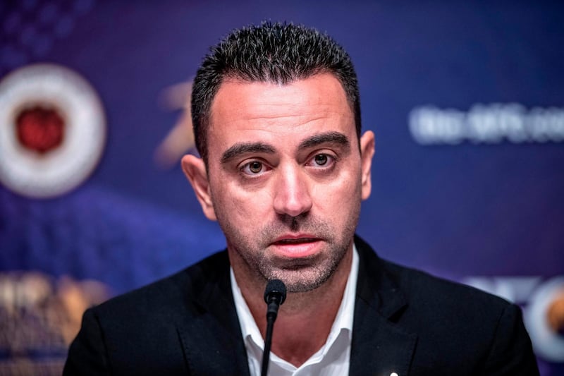 Al Sadd SC Manager Xavier Hernández Creus, also known as Xavi, speaks to the media after receiving the Asian Football Confederation (AFC) Men's Player of the Year 2019 award in place of absentee Akram Afif, during a press conference after the AFC Annual Awards ceremony in Hong Kong on December 2, 2019. / AFP / Philip FONG
