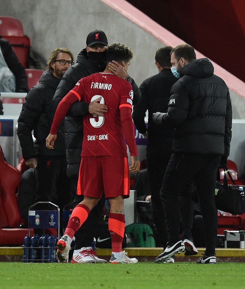 Liverpool's Roberto Firmino is substituted after picking up an injury. AFP