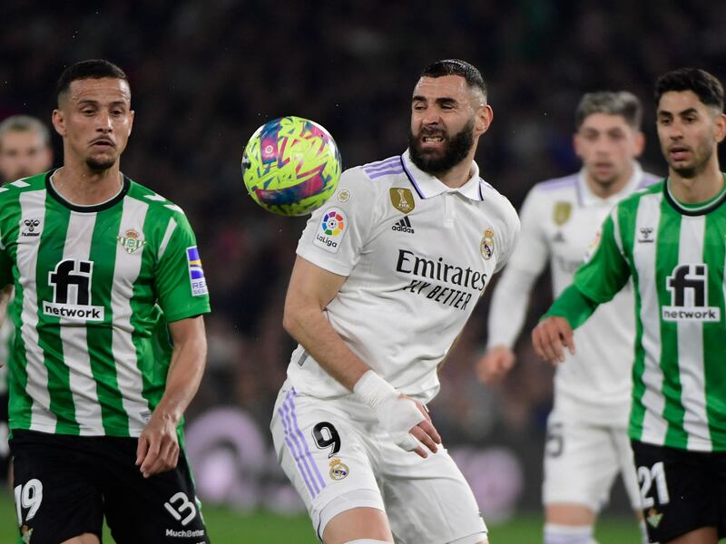 Real Madrid forward Karim Benzema, centre, vies with Real Betis defender Luiz Felipe during the Spanish La Liga match at the Benito Villamarin in Seville on March 5, 2023. The game ended 0-0. AFP