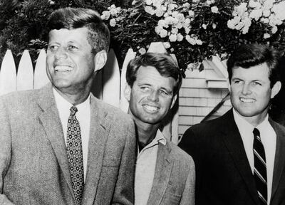 Lef to right, John F Kennedy, and brothers Robert and Ted, at Hyannisport, Massachusetts, about 1960. Alamy