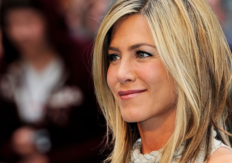 Before she was famous, Jennifer Aniston was a New York bike messenger for a day. Getty Images