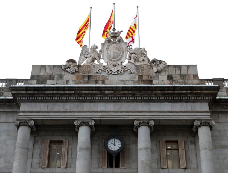 A clock on City Hall in Sant Jaume square, in front of the regional government headquarters the Generalitat, is seen at ten o'clock, the final deadline set by Spain's government for Catalan President Carles Puigdemont to retract an ambiguous declaration of independence, in Barcelona, Spain, October 19, 2017. REUTERS/Gonzalo Fuentes
