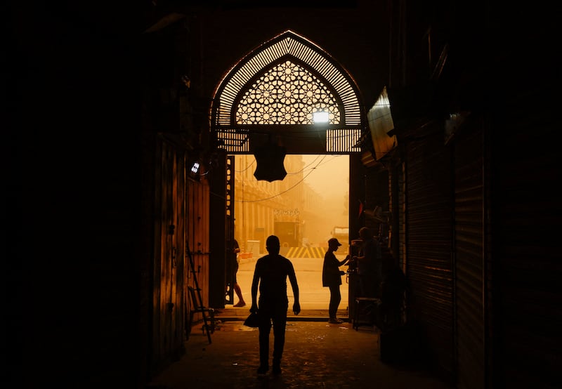 A dusty walk in Baghdad. Reuters