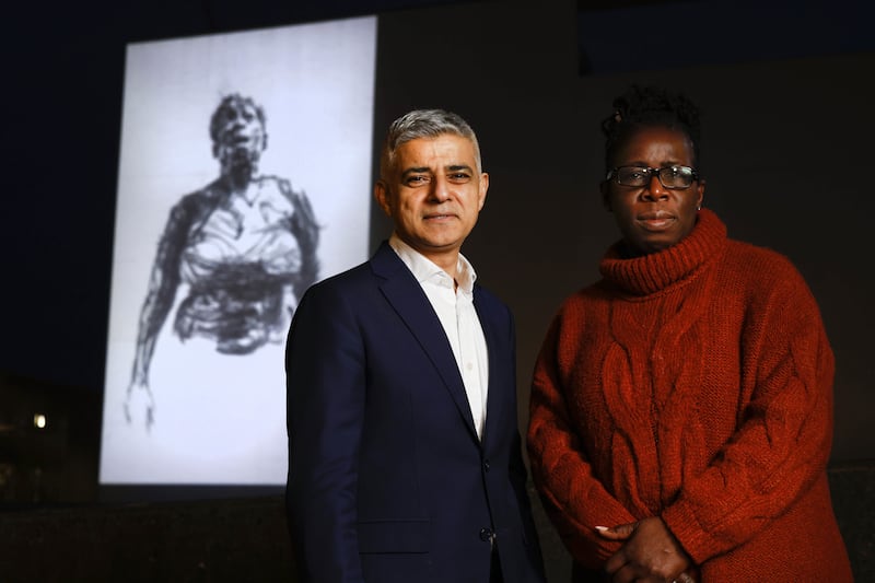Her mother Rosamund Adoo-Kissi-Debrah and London mayor Sadiq Khan at the unveiling of Breathe for Ella, an art projection at the city’s South Bank to commemorate the 10th anniversary her death. PA
