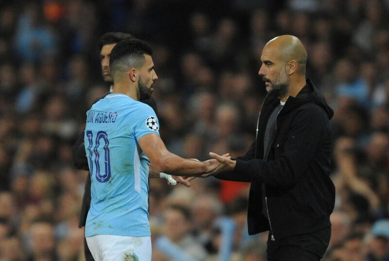 Pep Guardiola shakes hands with Sergio Aguero as he is substituted. Rui Vieira / AP Photo