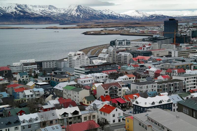 Traffic moves around the buildings in the Icelandic capital Reykjavik. Matt Cardy / Getty Images