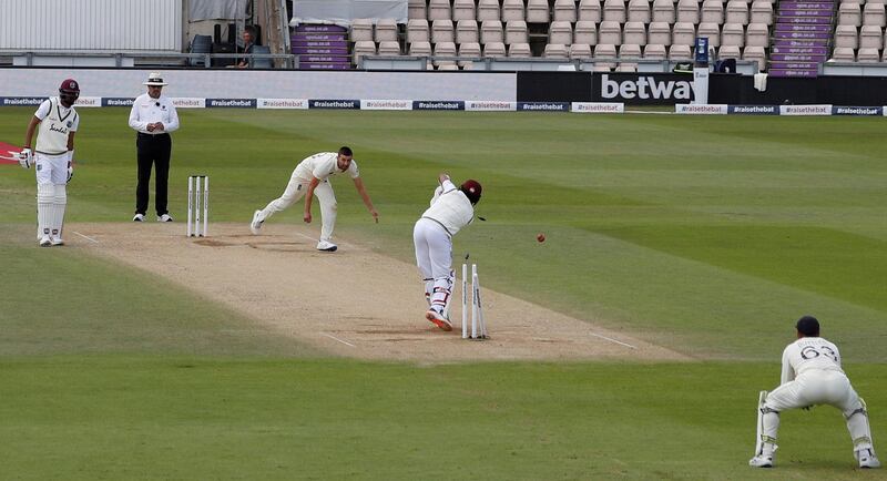England bowler Mark Wood bowls West Indies' Shai Hope. Reuters