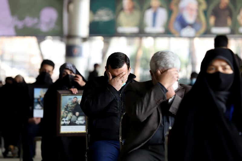 Mourners react during the commemoration Qassem Suleimani's assassination. West Asia News Agency via Reuters