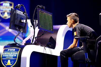 Stefano 'Pinna' Pinna of Belgium competes against  Marcus 'Marcuzo' Jorgensen (not pictured) of Denmark at the FIFA eWorld Cup 2018 at The O2 Arena in  London, Britain, August 4, 2018. REUTERS/Henry Nicholls