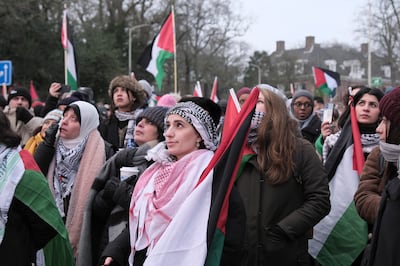 Pro-Palestinian campaigners outside the International Court of Justice in The Hague as judges hear South Africa's testimony on Thursday. AP 