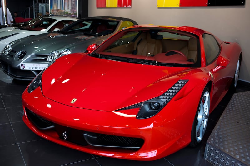 Dubai, United Arab Emirates - January 10 2012 - The Ferrari 458 Spider Italia, approximately worth Dh1.3 million sits in the Exotic Cars Showroom off Sheikh Zayed Road.The company was recently featured on Channel 4's "Billionaire Boy Racers" . (Razan Alzayani / The National)  