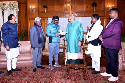 Jharkhand Chief Minister Hemant Soren, third left, submits his resignation to Jharkhand Governor CP Radhakrishnan, third right, in Ranchi on Wednesday, after Enforcement Directorate officials detained Mr Soren in relation to an alleged land scam. AFP