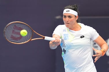 BEIJING, CHINA - OCTOBER 2: Ons Jabeur of Tunisia  in action match against Ashlyn Krueger of the United States during day 7 of the 2023 China Open at National Tennis Center on October 2, 2023 in Beijing, China. (Photo by Fred Lee / Getty Images)