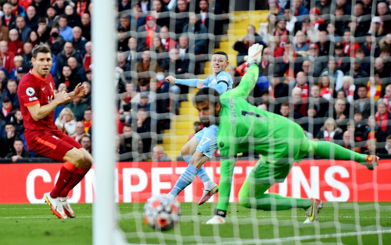 Manchester City's Phil Foden scores against Liverpool in the Premier League match at Anfield on Sunday, October 3. Reuters