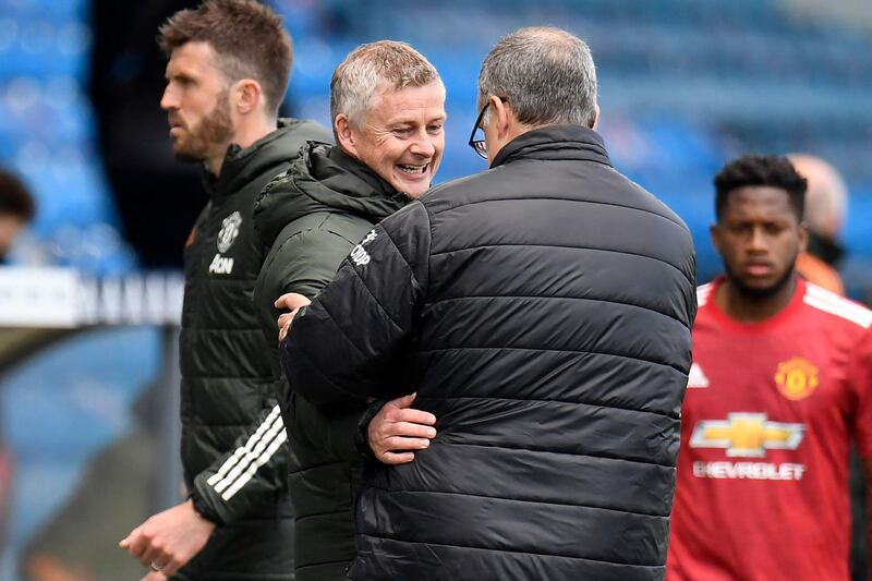 Manchester United's manager Ole Gunnar Solskjaer and Leeds United's coach Marcelo Bielsa. AFP