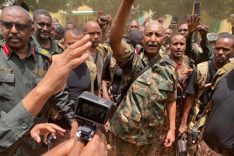 General Abdel Fattah Al Burhan visits soldiers in Khartoum on Tuesday, as a ceasefire with the RSF paramilitary fell apart. AFP