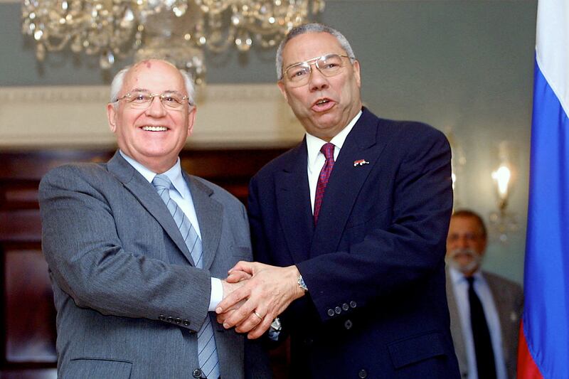 US Secretary of State Colin Powell shakes hands with Gorbachev in Washington in April 2001. AFP