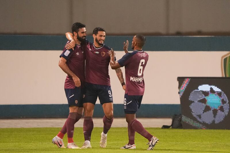 Al Wahda’s Omar Khrbin, left, and Joao Pedro, centre, celebrate their team’s 4-2 win over Emirates in the Adnoc Pro League at Emirates Stadium on Monday, April 4, 2022. Photo: PLC