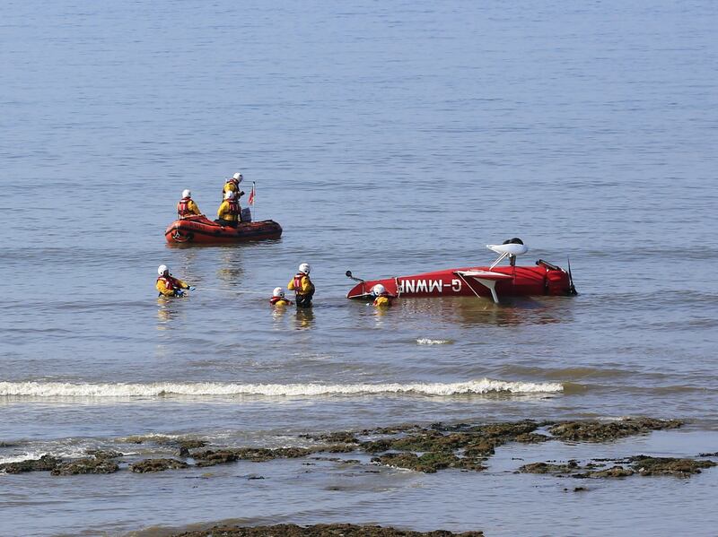 The upside-down plane in the sea after crashing off the South Wales coast on Tuesday. RNLI