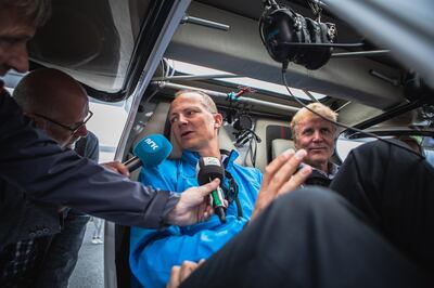 Ketil Solvik-Olsen, Norway's transport minister, left, speaks to a journalist as he sits in the cockpit of an Avinor AS Alpha Electro G2 electric two-seater plane with Dag Falk-Petersen, chief executive officer of Avinor AS, ahead of the inaugural flight at Oslo airport, in Gardermoen, near Oslo, Norway, on Monday, June 18, 2018. Home to some of the busiest flight routes in Europe, whisking passengers across a rugged and mountainous landscape, Norway’s aviation industry now readies to go electric. Photographer: Odin Jaeger/Bloomberg