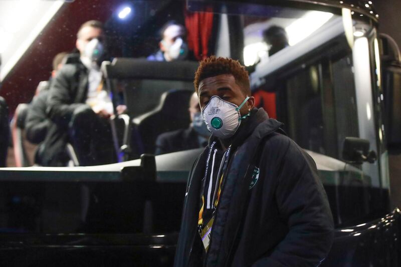 Bulgarian team Ludogorets players wear protective face masks while heading to the San Siro Stadium in Milan. AP