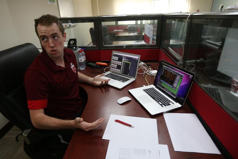 Chris Loxston at his Rashid Stadium desk, where he performs data analysis for Al Ahli. Pawan Singh / The National