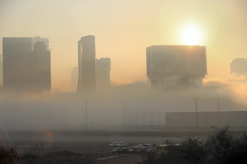 Abu Dhabi - United Arab Emirates - 22Dec2017 - Densed fog engulfed Abu Dhabi city in the morning having poor visibilty for motorist. Ravindranath K / The National