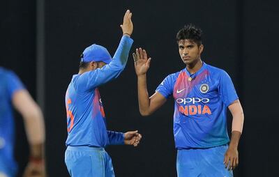 India's Washington Sundar, right, celebrates the dismissal of Sri Lanka's Jeevan Mendis with his team mate Rohit Sharma during their Twenty20 cricket match in Nidahas triangular series in Colombo, Sri Lanka, Monday, March 12, 2018. (AP Photo/Eranga Jayawardena)