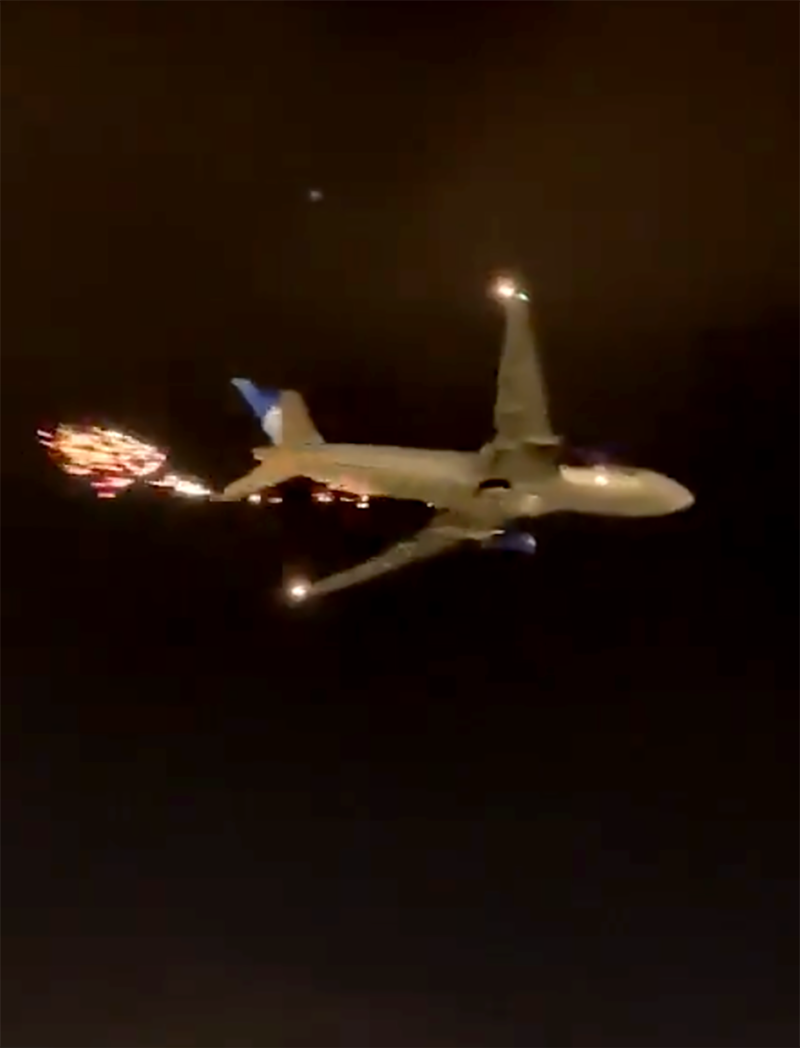 United Airlines flight UA149 was advised by the control tower its engine was producing sparks. Photo: Screengrab