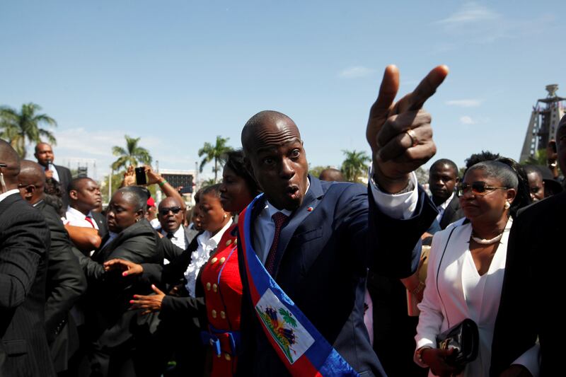 Jovenel Moise gestures during his arrival at the National Palace during his inauguration ceremony as president in Port-au-Prince in February 2017.