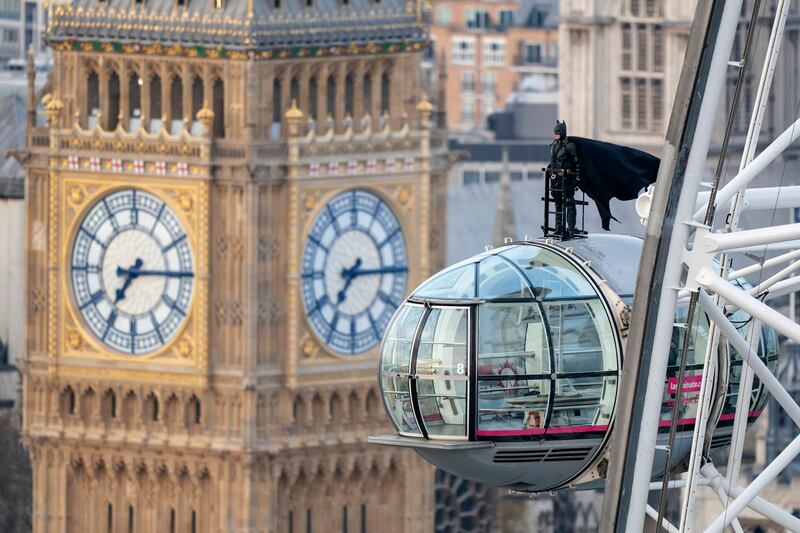 On Monday morning a man dressed as superhero Batman stood on top of a pod on the London Eye ahead of the release of 'The Batman' in cinemas across Britain. PA