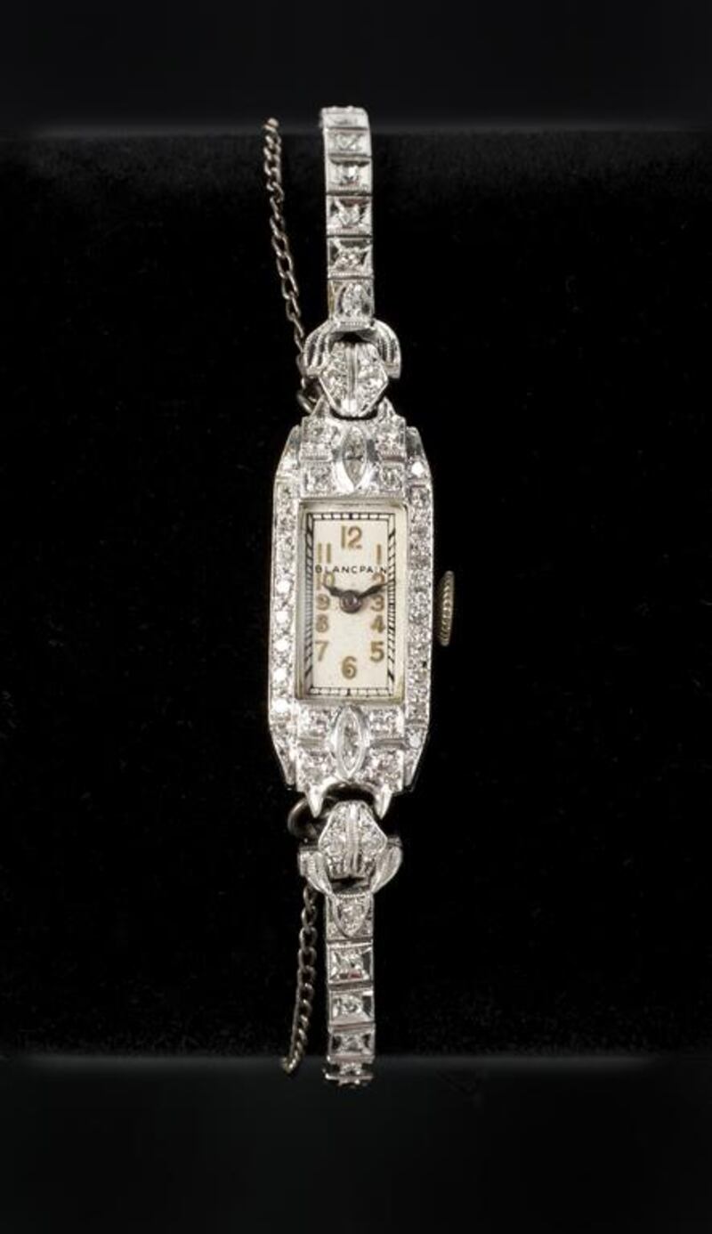 An art deco platinum and diamond cocktail watch from Blancpain. The watchcase is stamped KO 900 Plat 100 Irid, while the bracelet is set with 71 round diamonds and two marquise diamonds. Courtesy Julien's Auctions