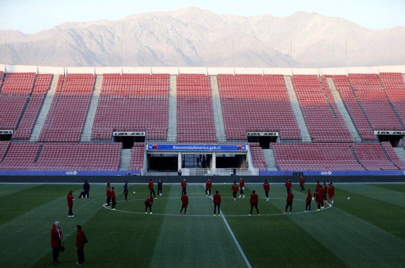 Peru's players train at the Estadio Nacional in Santiago on Sunday ahead of their Copa America semi-final against hosts Chile on Monday night. Henry Romero / Reuters / June 28, 2015