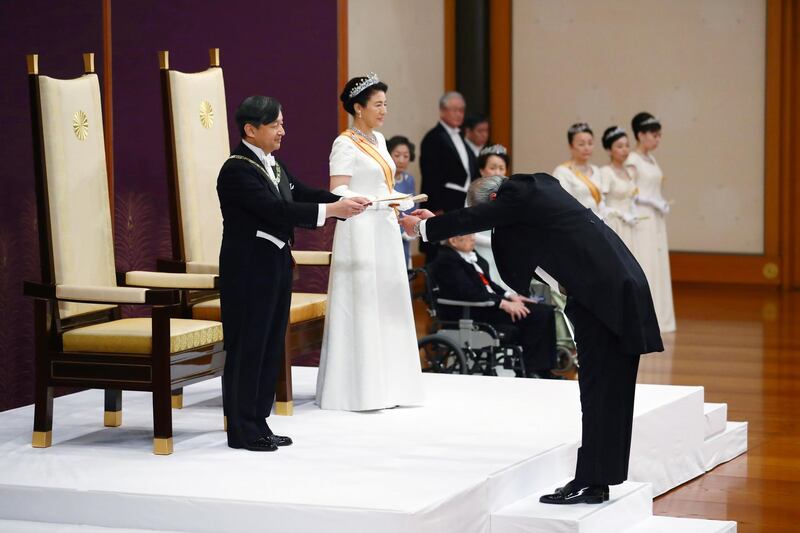 epa07539231 Japan's new Emperor Naruhito (L) and Empress Masako (2-L) attend the 'Sokui-go-Choken-no-gi', or First Audience after the Accession to the Throne, at the Imperial Palace in Tokyo, Japan. Japan's new Emperor Naruhito, 59, succeeded to his father Akihito who abdicated on 30 April. The ascension to the Chrysanthemum throne of Emperor Naruhito marks the beginning of the Reiwa era.  EPA