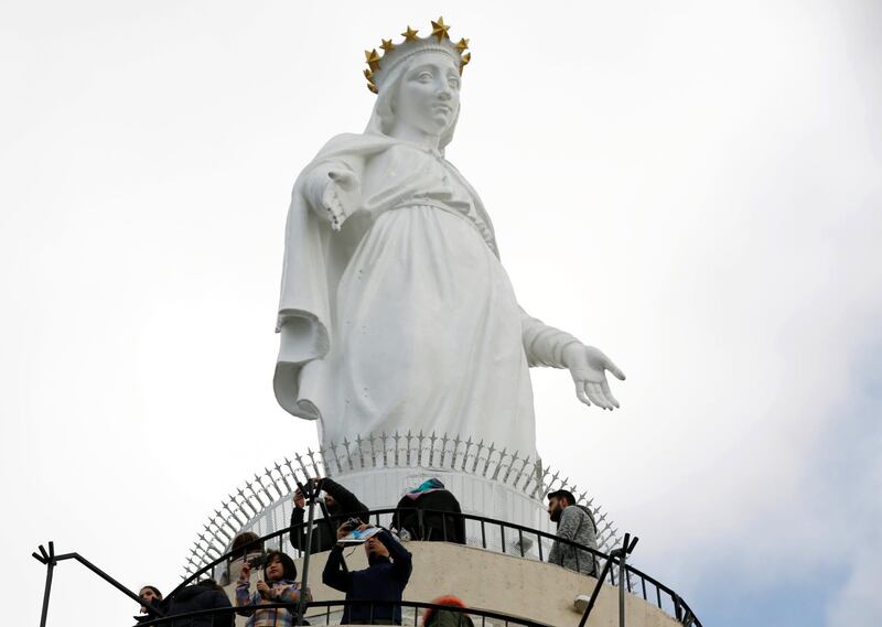 Christians and Muslims visit the statue of Our Lady of Lebanon during Epiphany holiday in Harissa, Lebanon. Reuters