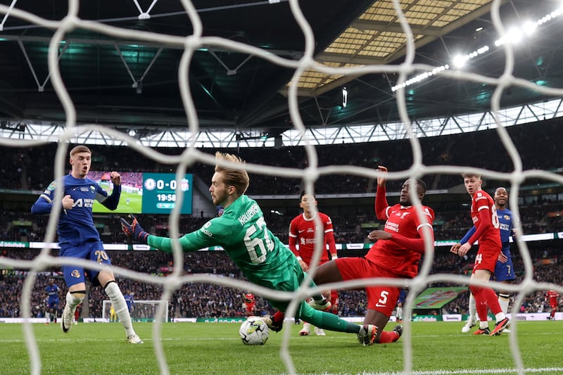 LIVERPOOL RATINGS: Brilliant performance filling the big shoes of Alisson. Fabulous point-blank save to deny Palmer goal in first half. Two excellent stops from Gallagher and Palmer late in second half of normal time. Getty Images