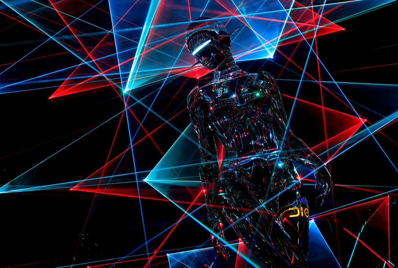 A 12-metre-high robot sculpture by Japanese artist Hajime Sorayama stands in the centre of the catwalk of the Dior Men Pre-Fall 2019 collection by British fashion designer Kim Jones in Tokyo, Japan. EPA