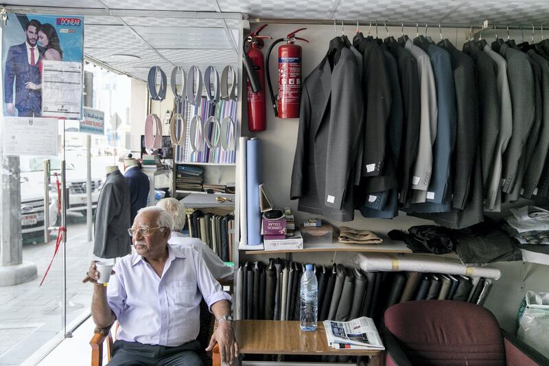 Abu DHABI, UNITED ARAB EMIRATES - SEPTEMBER 13, 2018. 

Mohammad Imtiaz, at his shop Mohd Rasheed Tailoring. Mohammed has been in the UAE for almost 42 years.

(Photo by Reem Mohammed/The National)

Reporter: John Dennehy
Section: NA