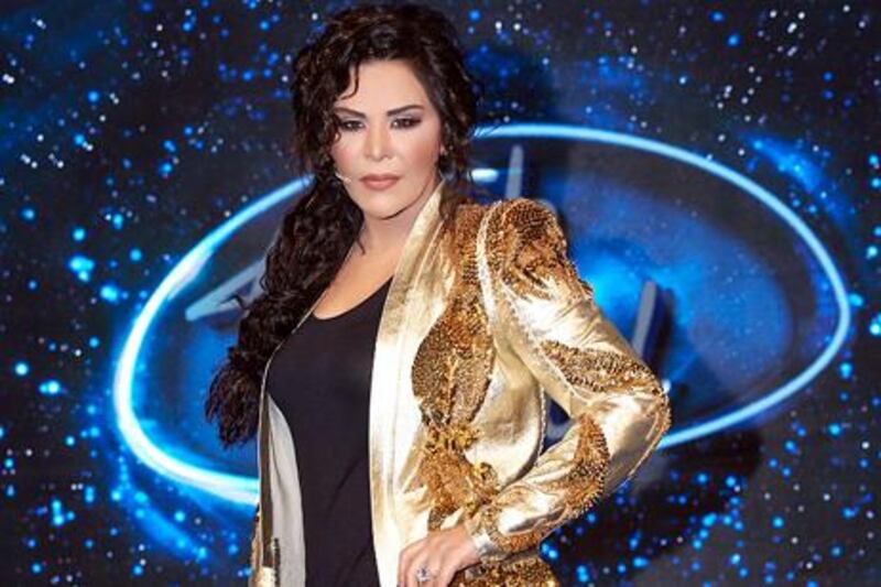 singer Ahlam managed to bedazzle the audience and everyone present during last weekÕs LIVE episode of Arab Idol Season 2 (aired on MBC1 and MBC MASR) with three distinguished pieces from Roberto Cavalli and a pair of Louboutins that complemented her attire. Moreover, Ahlam glimmered with a beautiful diamond ring from Diamond by Jacobs. Her hair was elegantly done by celebrity hair stylist Tony Sawaya creating a chic and classy overall look on the red carpet.
credit: Courtesy Arab Idol